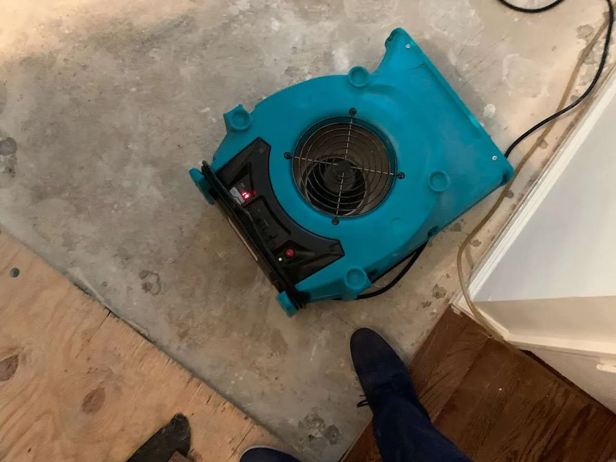 Air mover drying subfloor during Leak Detection & Repair in Yucca Valley